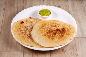 Dosa , Dosai, ghee roast, tomato coconut chutney sambar popular South Indian Breakfast, Kerala, Tamil Nadu India. Top view of Masala dosa Kerala breakfast food. Indian food