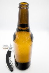 Brown bottle with light beer.
