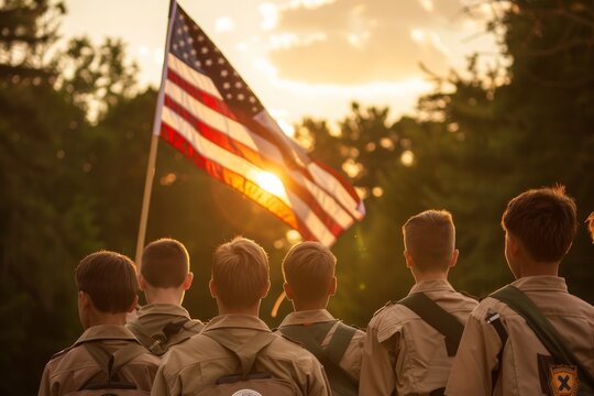 Boy Scouts Salute American Flag During Sunset Ceremony