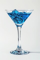 Glass of Blue Lagoon cocktail. Blue background