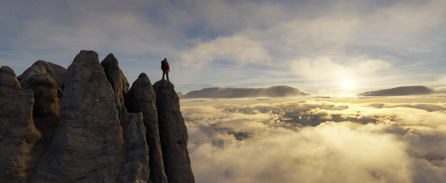 Adventure Man Hiker high in mountains. Landscape in Background. Sunset.