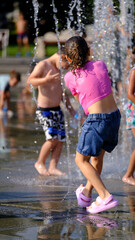 Joyful Sprinkler Splash. Splashing into Summer Fun.