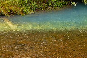 the place, where the Rio Celeste river is changing into blue in the Tenorio National Park in Costa Rica