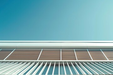 Obraz premium Close-Up of Industrial Building Roof with Light Brown Tiles and White Vertical Stripes Against Blue Sky with Clouds