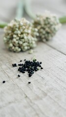 Dried onion flower seeds on the table.
