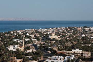 Obraz premium View of Dahab and Red Sea on sunny spring evening, Egypt.