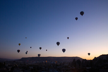 beautiful scenery flight of balloons in the mountains of Cappadocia in love valley
