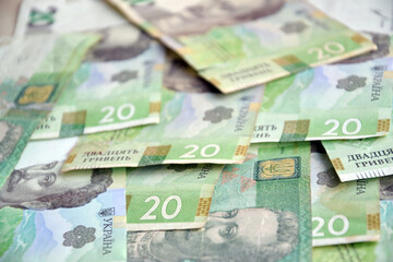 Processed collage of Ukrainian Hryvnia UAH bills banknotes texture. Background for banner