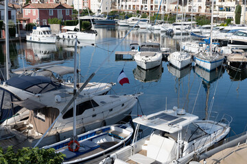 Travel and summer vacation destination, view on houses, roofs, canals and boats in Port Grimaud, Var, Provence, French Riviera, France