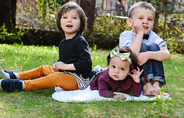 Portrait of three siblings having fun outdoor