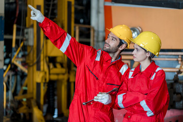 Engineer checking construction process railway and checking work on railroad station . Railway...