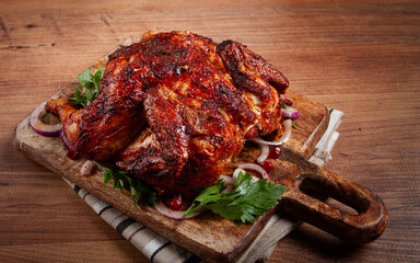 whole fried chicken, with spices, grilled chicken, on a chopping board, top view, homemade, no people,