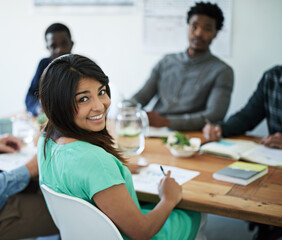 Woman, portrait and happy in boardroom for workshop or training on meeting for skill development. People, employees and smile with confidence for team building and collaboration for career growth