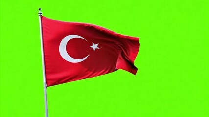 Turkey national flag waving in the wind in slow motion against a chroma key green screen.