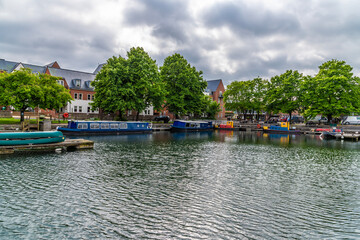 A view towards the dock in the ship canal basin in Chichester, Sussex in summertime