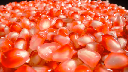 Closeup of fresh pomegranate seeds.