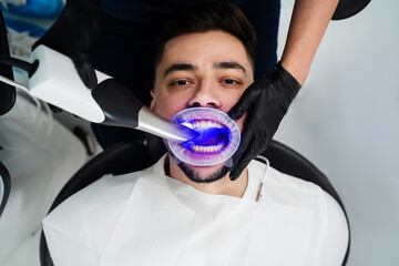Dental scanner applying in stomatology clinic. Assessment of patient teeth condition with dental...