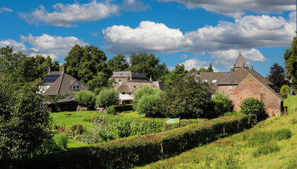 Fototapeta premium Beautiful rural countryside idyllic old dutch village near Ravenstein - Neerlon, Netherlands, Noord-Brabant