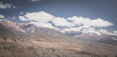 Panorama of Tien Shan mountain range with snow and glaciers, mountain range landscape for background