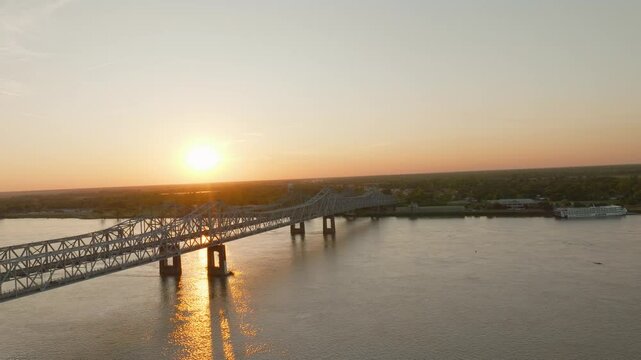 Drone Video of Sunset Over Bridge in Natchez Mississippi on the Mississippi River