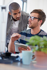 Men, colleague and tablet in office for brainstorming, project or coworkers as web designer. Male people, technology and discussion for communication, teamwork or collaboration in digital agency