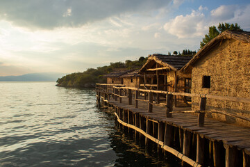 mud houses bungalow on the shore of the lake