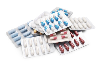 Different antibiotic pills in blisters isolated on white