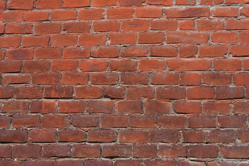 texture of old cracked and destroyed red brick wall