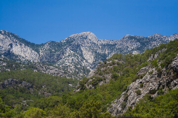 beautiful landscape of rocky mountains against blue sky