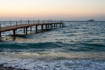 a beautiful ship is sailing in the blue sea