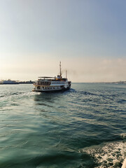 Fototapeta premium a beautiful ship is sailing in the blue sea