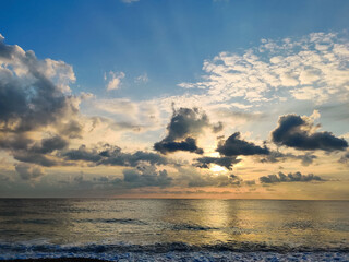 beautiful dramatic landscape of sunset on the sea beach