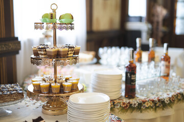 Delicious sweet cakes and desserts at the festive candy bar