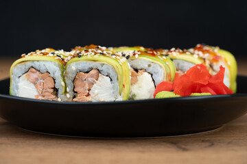 delicious traditional Japanese sushi and rolls on a plate