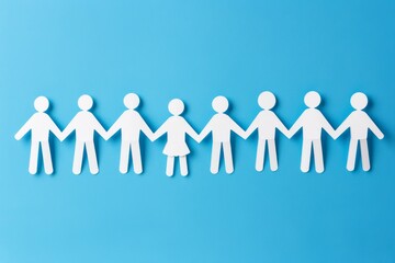 Team, society, and business concept depicted as paper people standing hand in hand
