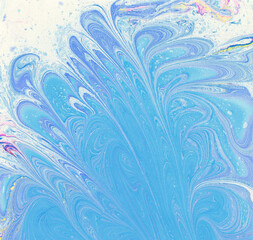 Ebru painting in water. Art Abstract blue color blots background. Marble paper texture.