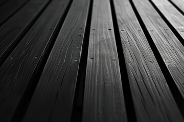 Simple black and white photo of a wooden floor pattern