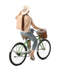 Woman on bicycle with basket against white background, back view