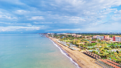 Aerial view of tropical sand beach with blue turquoise sea water