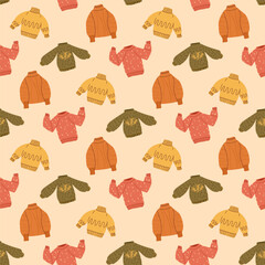 Cozy clothes seamless pattern. Sweaters repeat background. Vector hand drawn flat illustration.