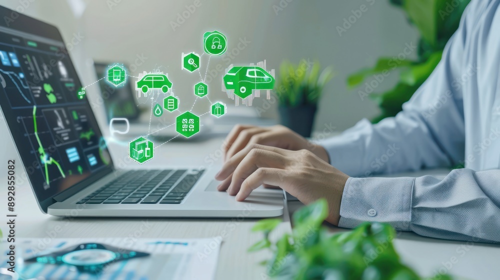 Poster A person working on a laptop with a digital interface showing various green icons related to technology and transportation