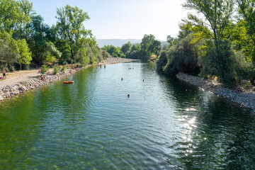 River beach in the town of Valhelhas surrounded by green mountains near Serra da Estrela-Valhelhas-Portugal.