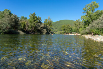 River beach in the town of Valhelhas surrounded by green mountains near Serra da Estrela-Valhelhas-Portugal.