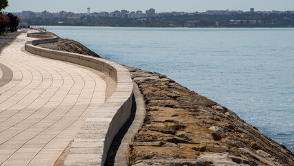 Serpent-shaped wall next to the Tagus river in the town of Barreiro
