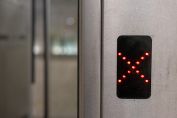 Red X-shaped sign preventing pedestrian access on tourniquets