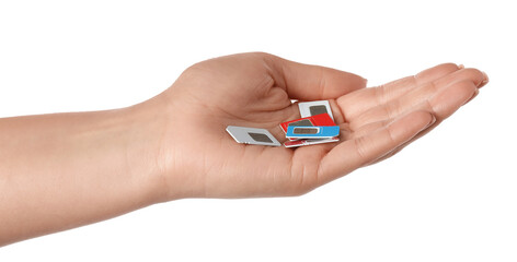 Woman with SIM cards on white background, closeup