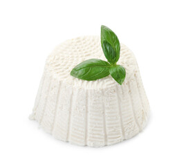 Fresh ricotta (cream cheese) and basil isolated on white