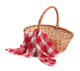 One picnic wicker basket with checkered napkin isolated on white