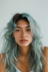 Naklejka premium A woman with long green hair and freckles.