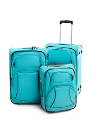 Three turquoise blue Suitcases isolated on white background